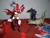 This isn't really a crossover because Getter actually fights dinosaurs in the anime/manga, but it's still kind of awesome.