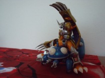 Tachikoma gives Wargreymon a horsey ride!